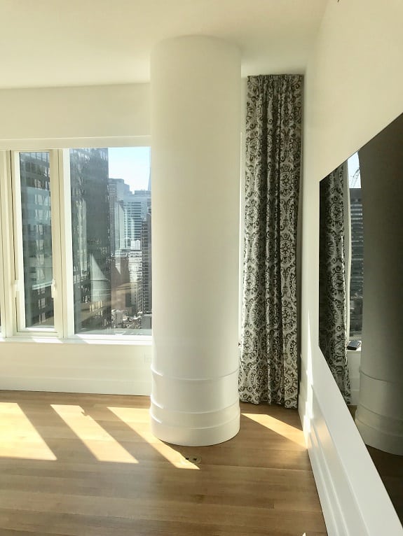 252 east 57 St side panel & Rollease battery motor Shades 1