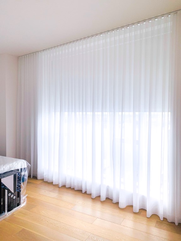 West End Avenue Somfy Line Voltage Blackout Shades Behind Sheer Ripple Fold Draperies